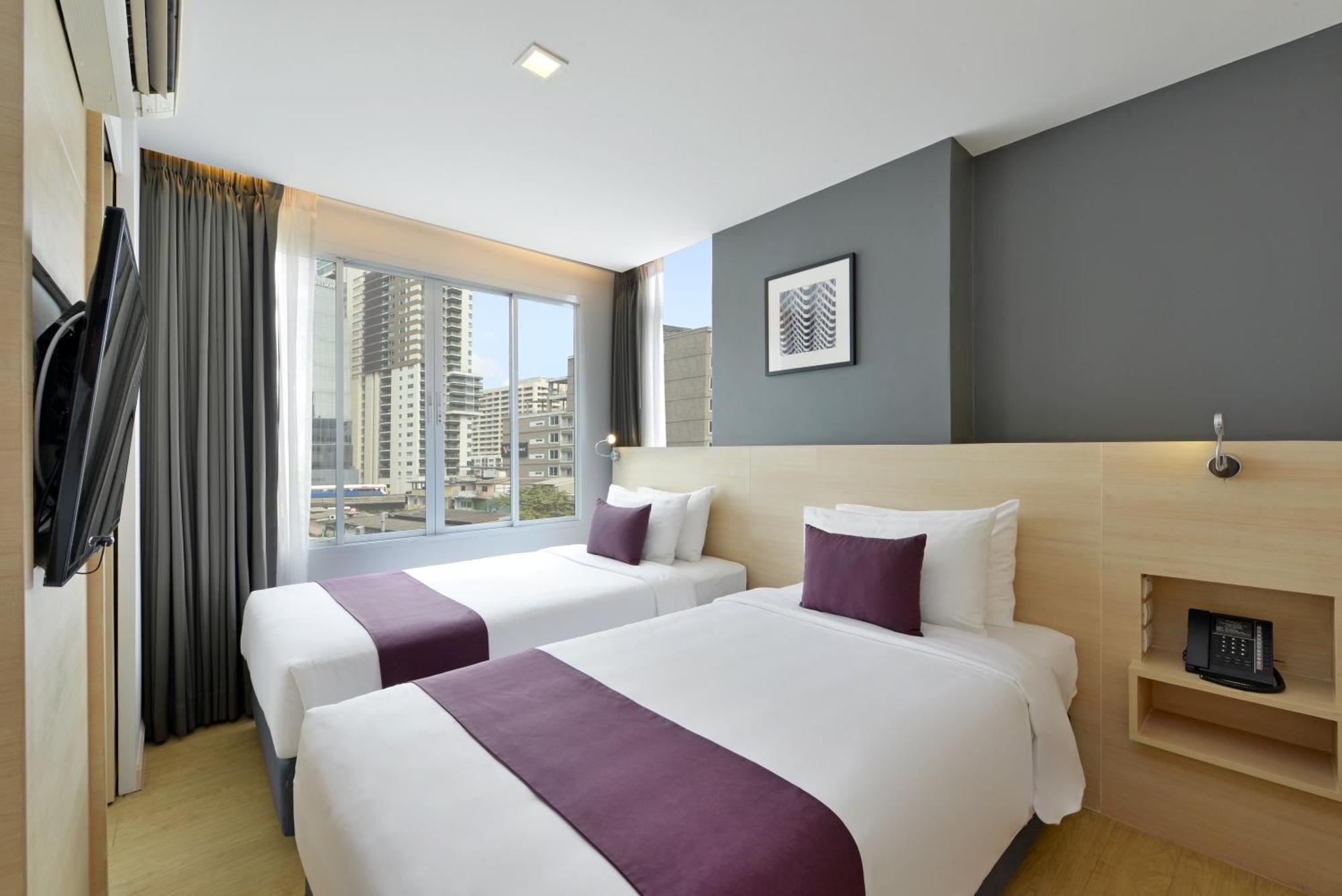 Arize Hotel Sukhumvit Банкок Стая снимка