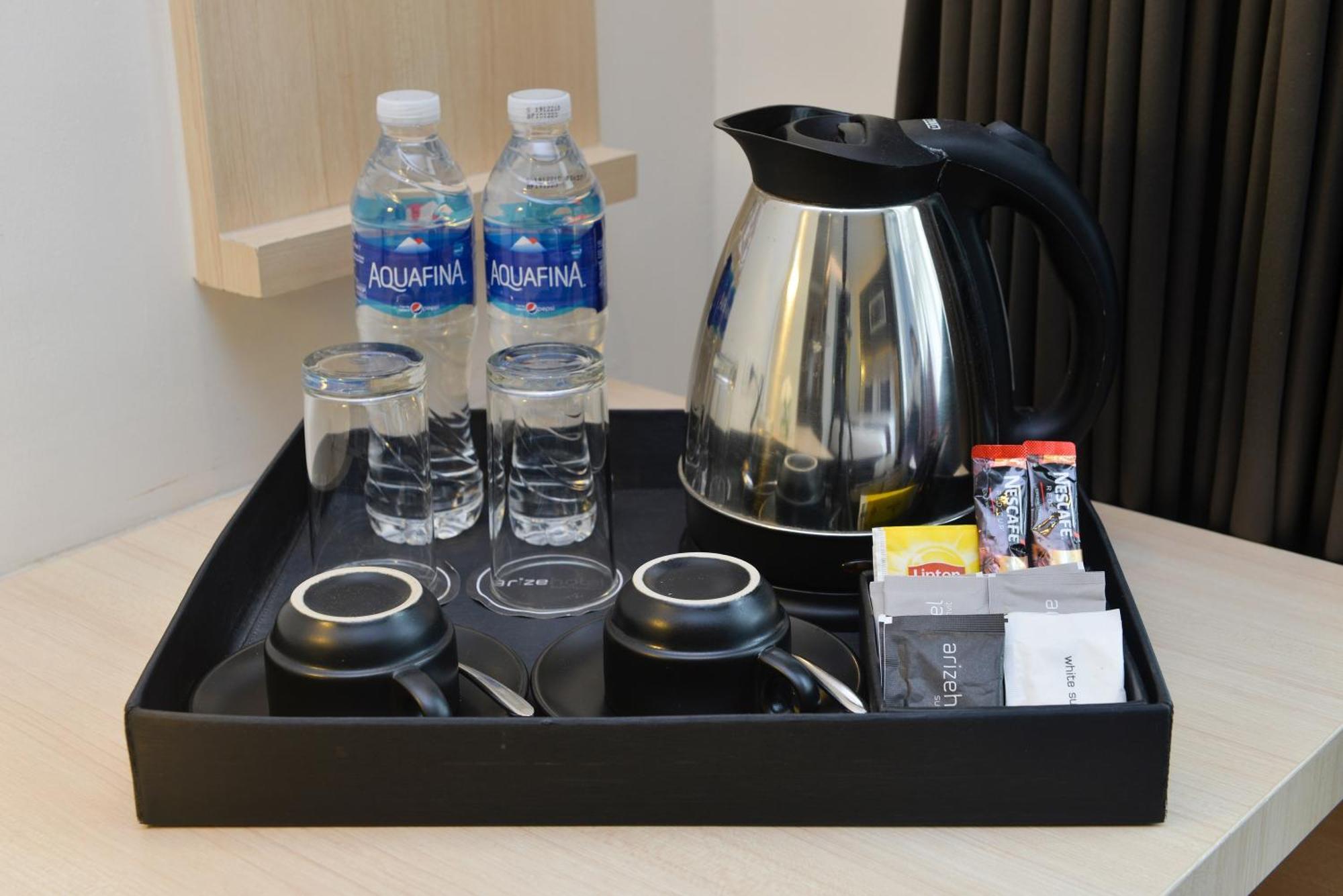 Arize Hotel Sukhumvit Банкок Стая снимка